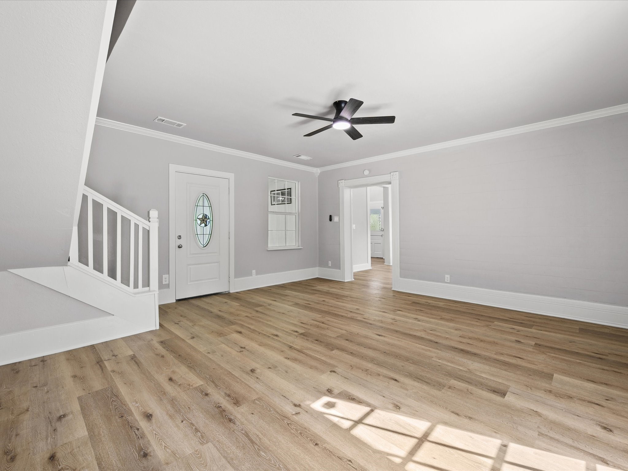 16958 Cedar Road Plantersville, TX 77363 - Photo 7 of 38 a view of empty room with wooden floor and fan