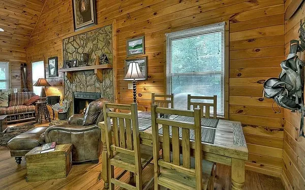 a front view of a building with outdoor seating