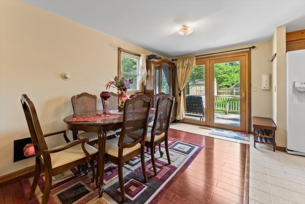 239 Ellendale Circle Springfield, MA 01128 - Photo 12 of 42 a view of a dining room with furniture window and outside view