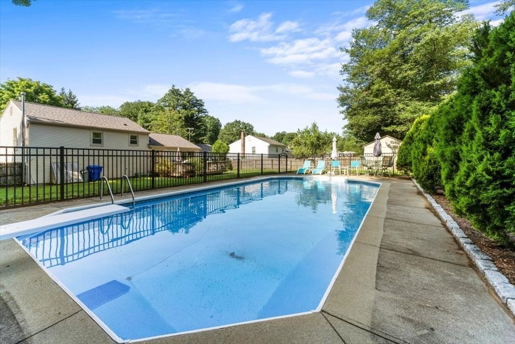 239 Ellendale Circle Springfield, MA 01128 - Photo 2 of 42 a view of swimming pool with outdoor seating