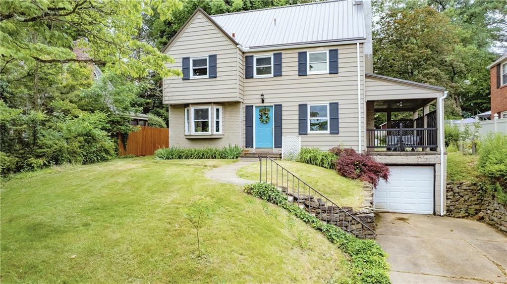 1025 Old Gate Road Pittsburgh, PA 15235 - Photo 1 of 27 a front view of a house with a yard outdoor seating and garage