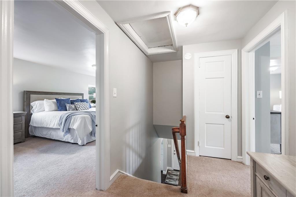 1025 Old Gate Road Pittsburgh, PA 15235 - Photo 12 of 27 a bedroom with a bed and a mirror
