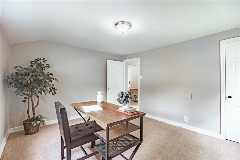 1025 Old Gate Road Pittsburgh, PA 15235 - Photo 15 of 27 a view of a livingroom with furniture and a potted plant