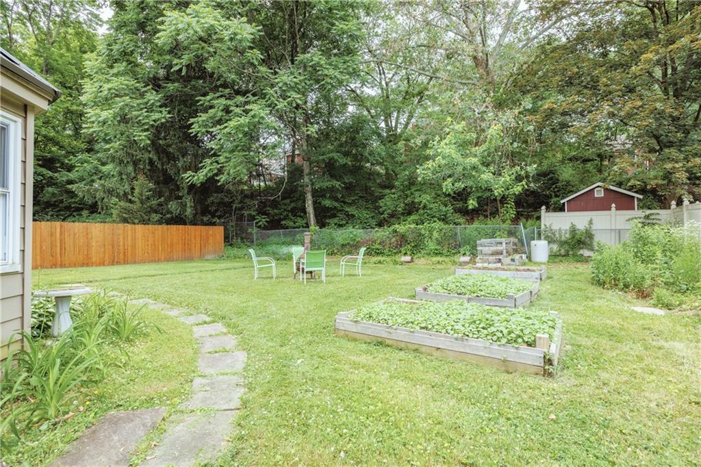 1025 Old Gate Road Pittsburgh, PA 15235 - Photo 23 of 27 a view of a backyard with a garden