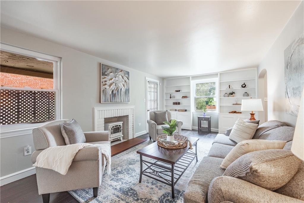 1025 Old Gate Road Pittsburgh, PA 15235 - Photo 5 of 27 a living room with furniture and a fireplace