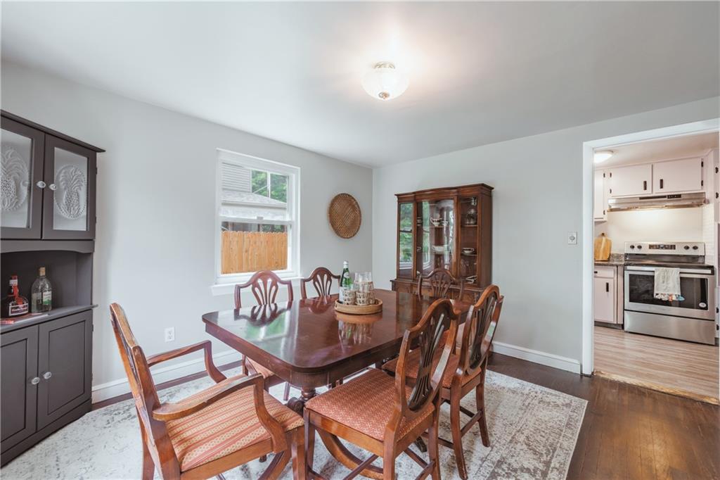 1025 Old Gate Road Pittsburgh, PA 15235 - Photo 8 of 27 a dining room with furniture and wooden floor