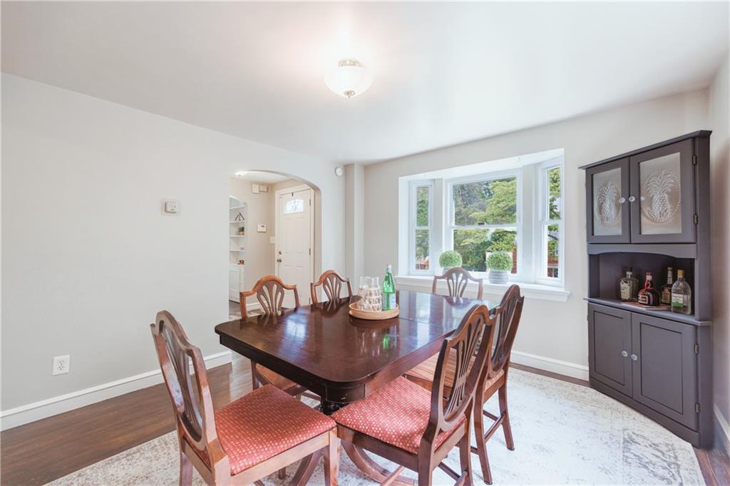 1025 Old Gate Road Pittsburgh, PA 15235 - Photo 9 of 27 a view of a dining room with furniture and a window
