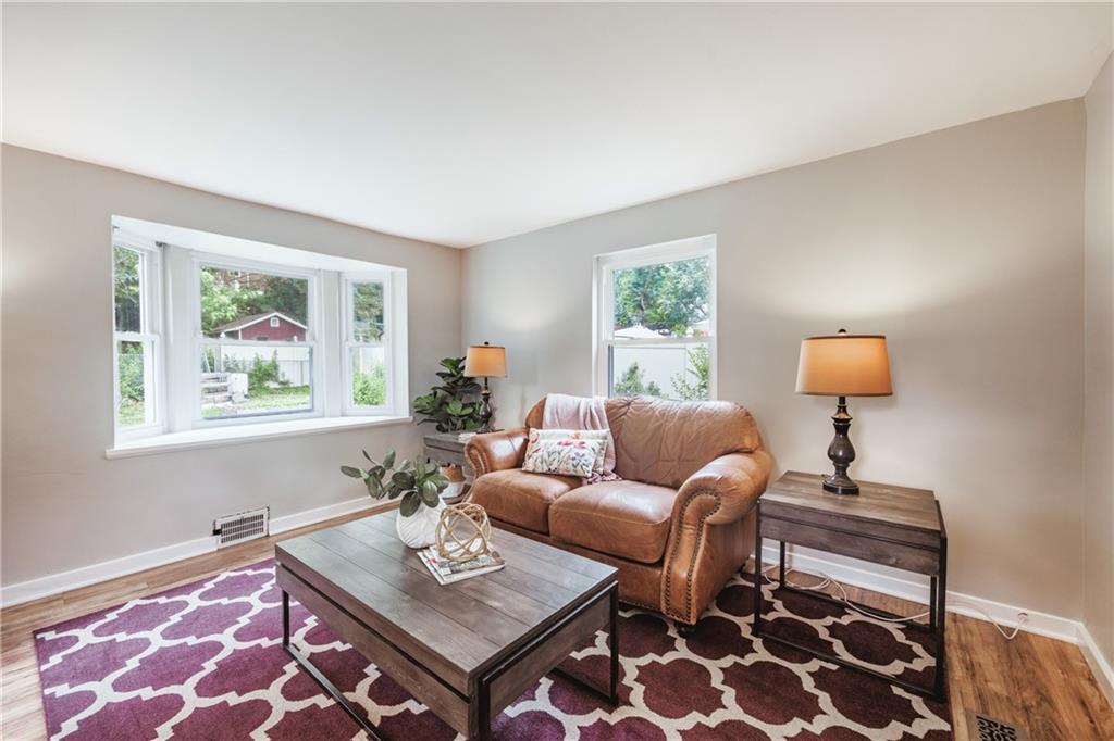 1025 Old Gate Road Pittsburgh, PA 15235 - Photo 10 of 27 a living room with furniture and a window