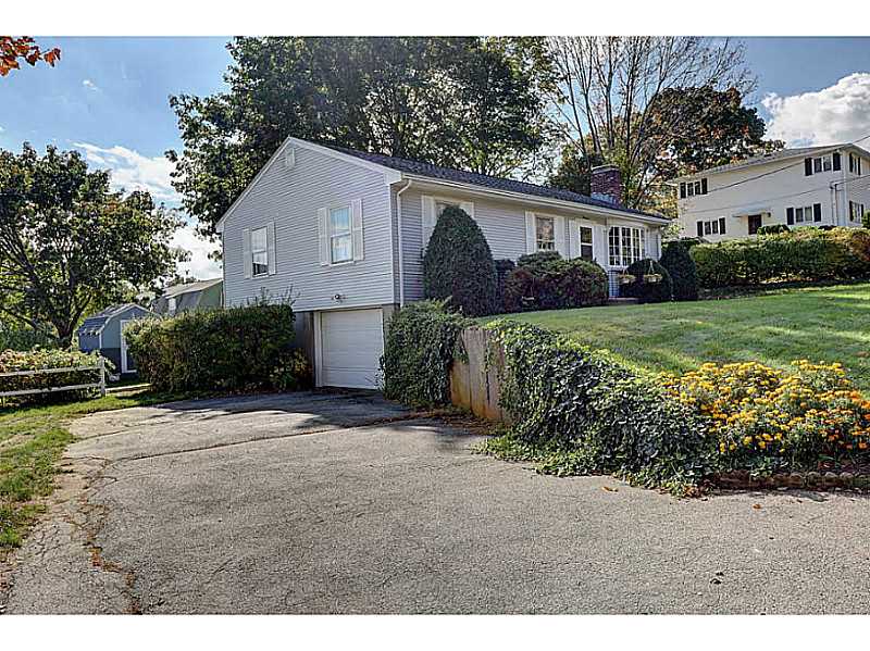 66 Rabbitt Hill Road Cumberland, RI 02864 - Photo 2 of 21 Exterior Front. side of home with 1 stall garage with electric opener