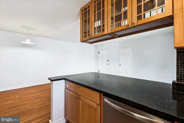 a kitchen with a stove and a microwave