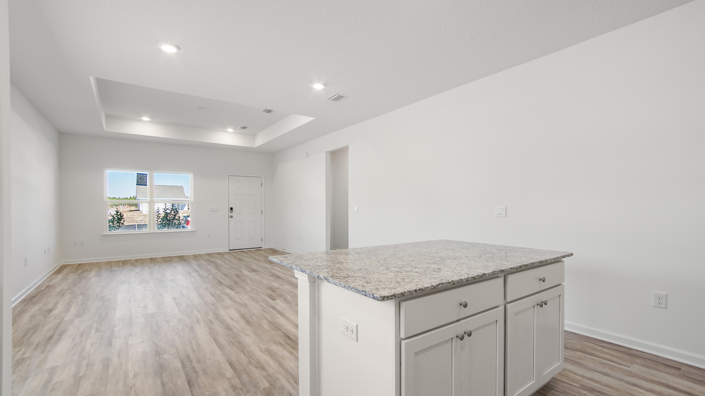 186 Huckleberry Street Freeport, FL 32439 - Photo 6 of 33 a view of storage and utility room with wooden floor