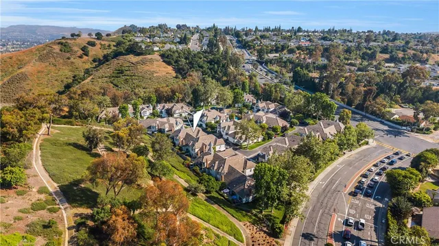 an aerial view of residential house with outdoor space