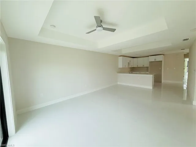 a view of a refrigerator in a room