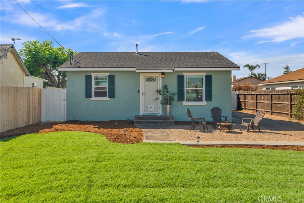 848 Mentone Avenue Grover Beach, CA 93433 - Photo 1 of 33 a backyard of a house with table and chairs