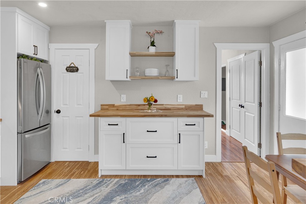 848 Mentone Avenue Grover Beach, CA 93433 - Photo 15 of 33 a kitchen with stainless steel appliances a refrigerator and a stove