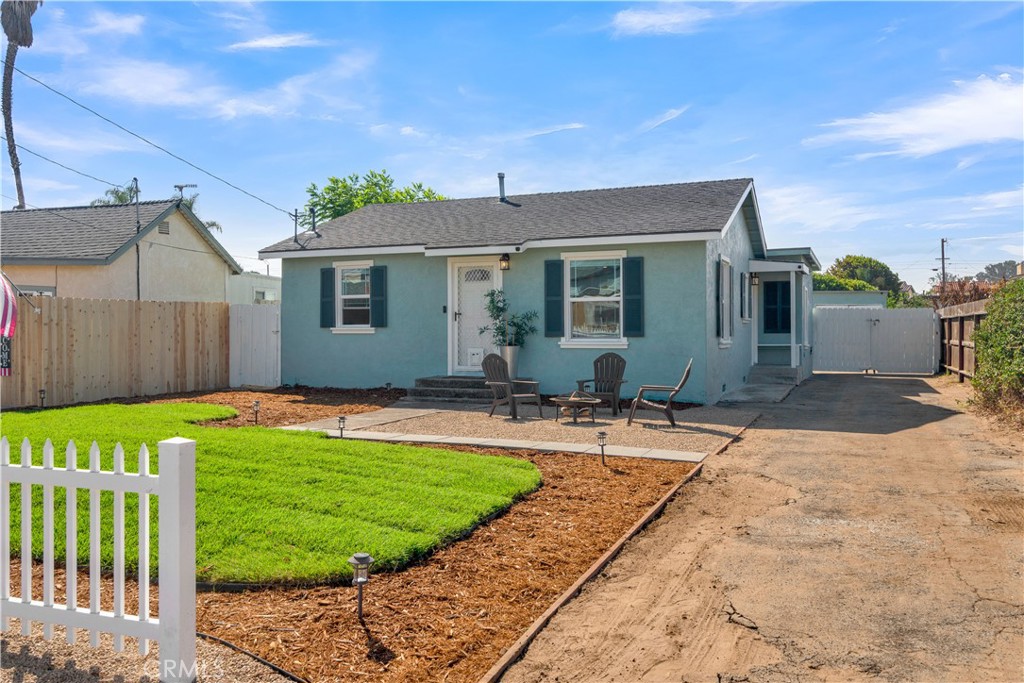 848 Mentone Avenue Grover Beach, CA 93433 - Photo 2 of 33 a view of a house with backyard and sitting area