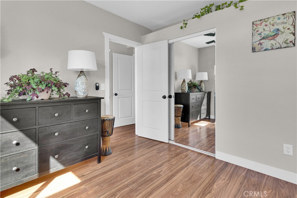 848 Mentone Avenue Grover Beach, CA 93433 - Photo 20 of 33 a view of a hallway and wooden floor with cabinet