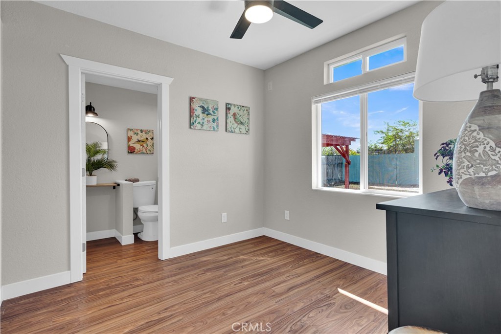 848 Mentone Avenue Grover Beach, CA 93433 - Photo 21 of 33 a view of kitchen with wooden floor electronic appliances and window