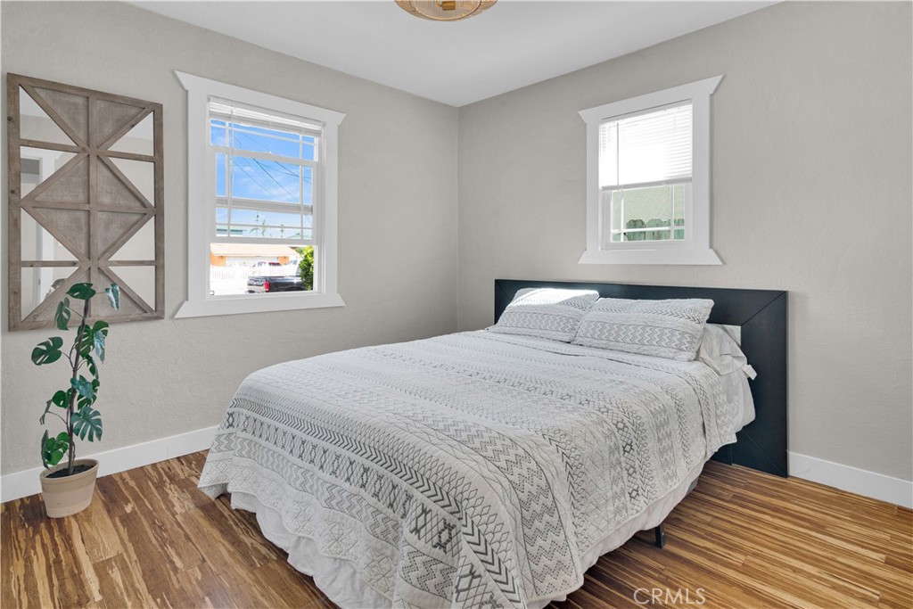 848 Mentone Avenue Grover Beach, CA 93433 - Photo 24 of 33 a bedroom with bed and window