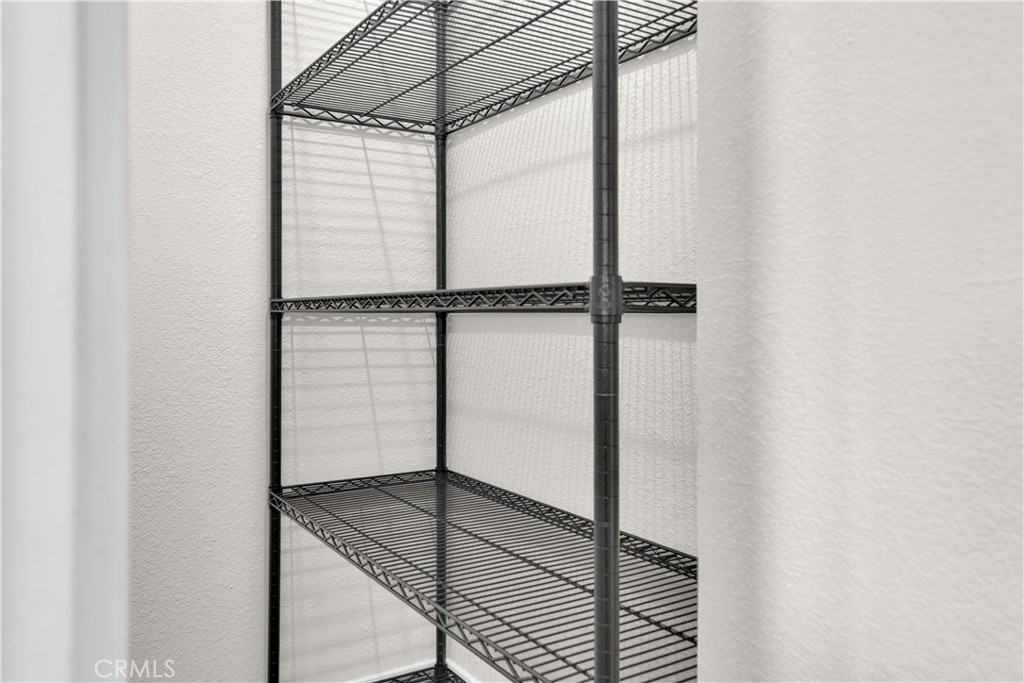 848 Mentone Avenue Grover Beach, CA 93433 - Photo 31 of 33 a view of a room with racks on the wall
