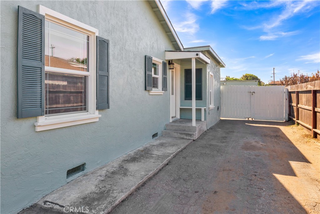848 Mentone Avenue Grover Beach, CA 93433 - Photo 4 of 33 a view of a house with backyard and parking