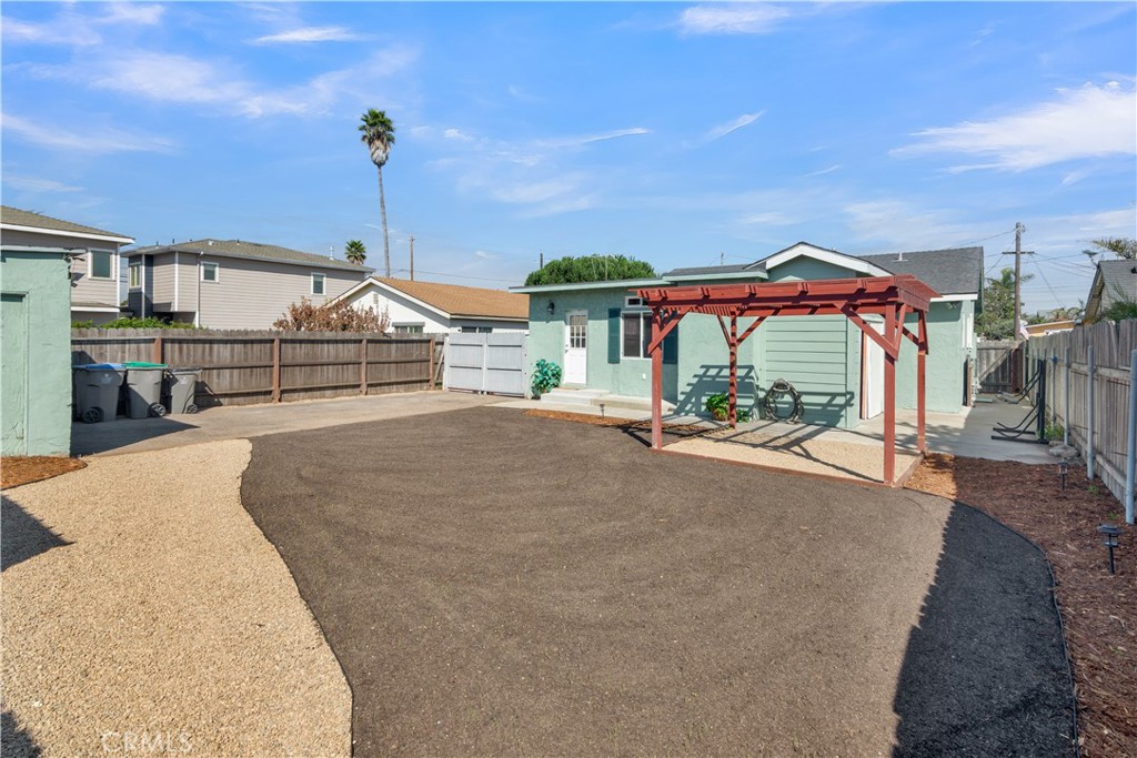 848 Mentone Avenue Grover Beach, CA 93433 - Photo 7 of 33 a view of a house with a patio