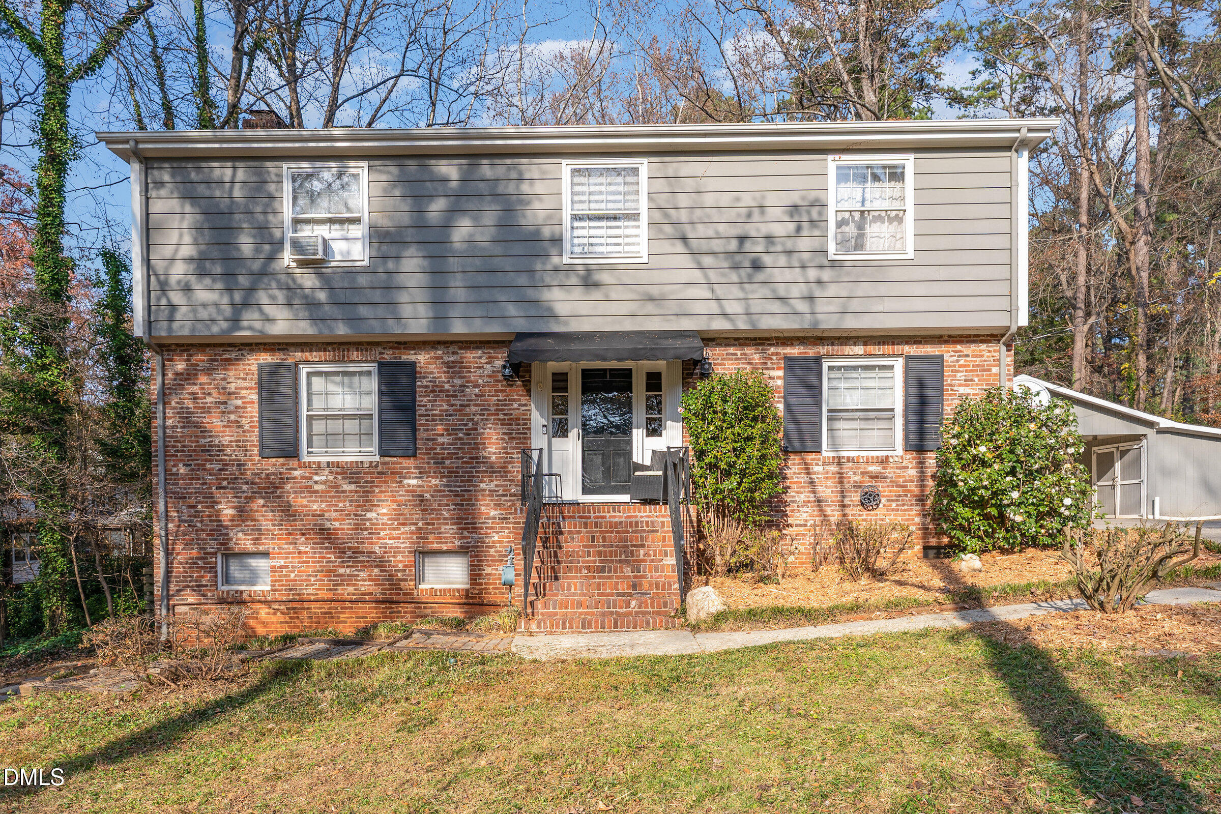 3704 Pembrook Place Raleigh, NC 27612 - Photo 2 of 67 front view of a house with a yard