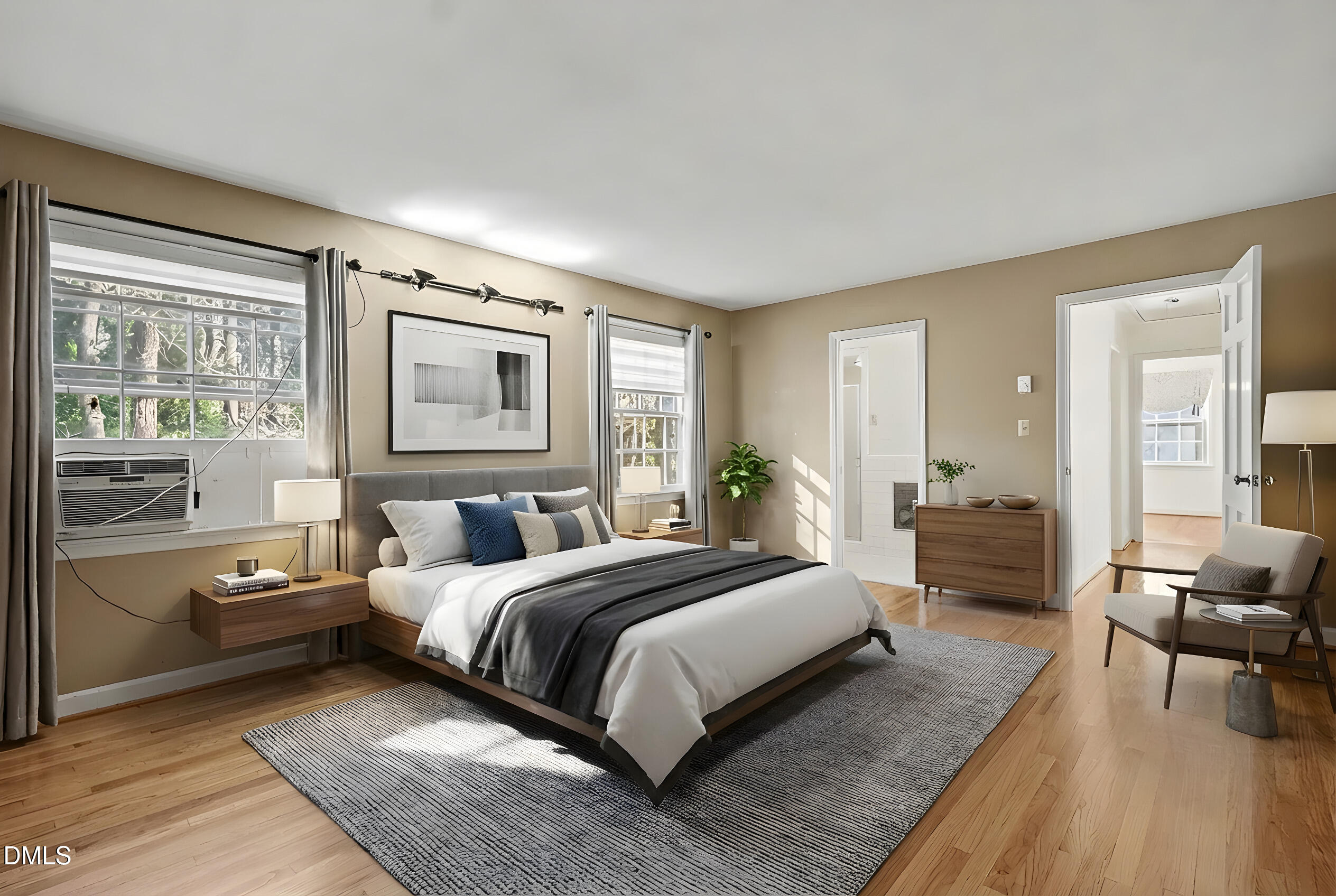 3704 Pembrook Place Raleigh, NC 27612 - Photo 27 of 68 a bedroom with a large bed and windows