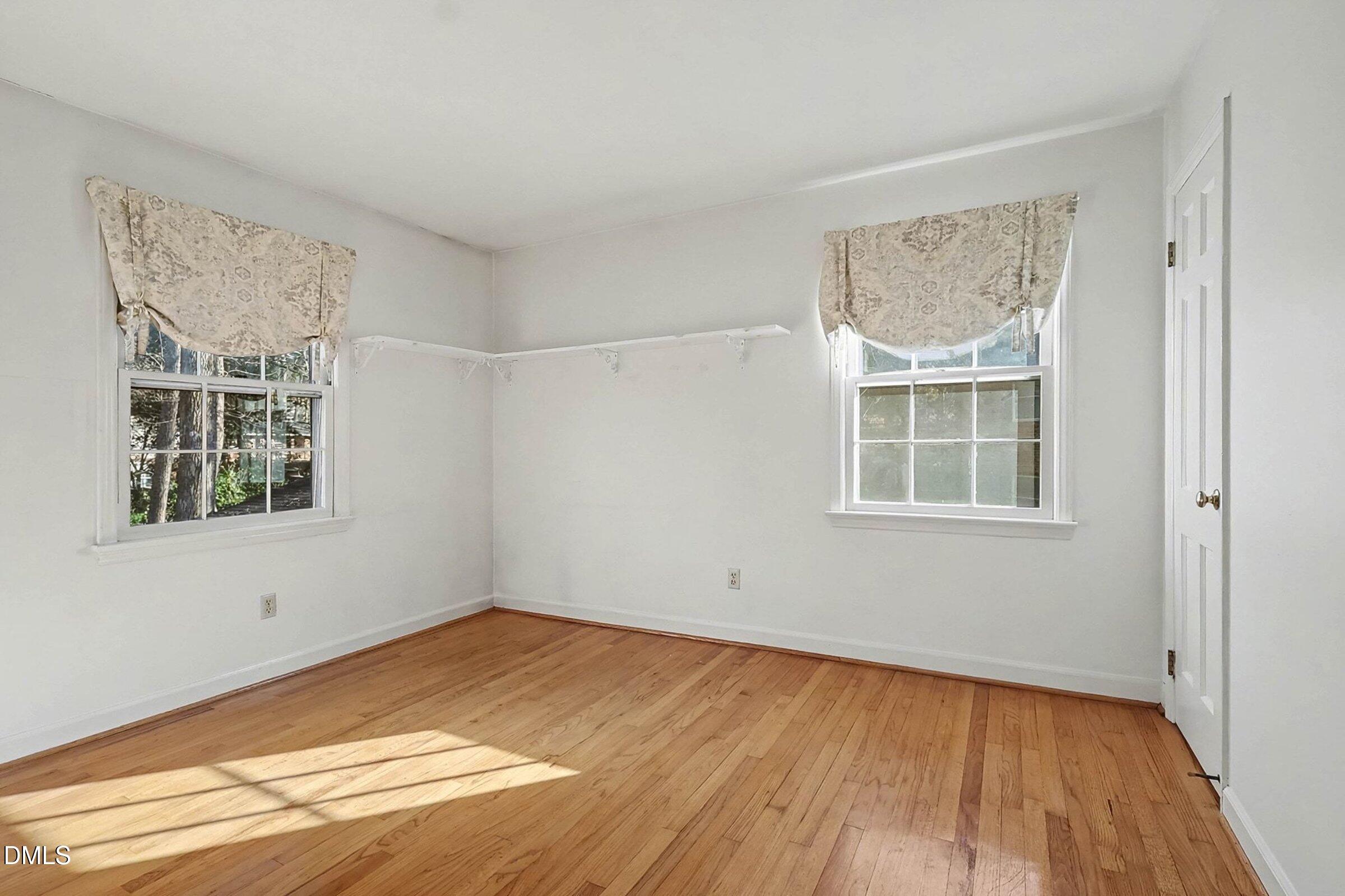3704 Pembrook Place Raleigh, NC 27612 - Photo 37 of 68 a view of empty room with windows