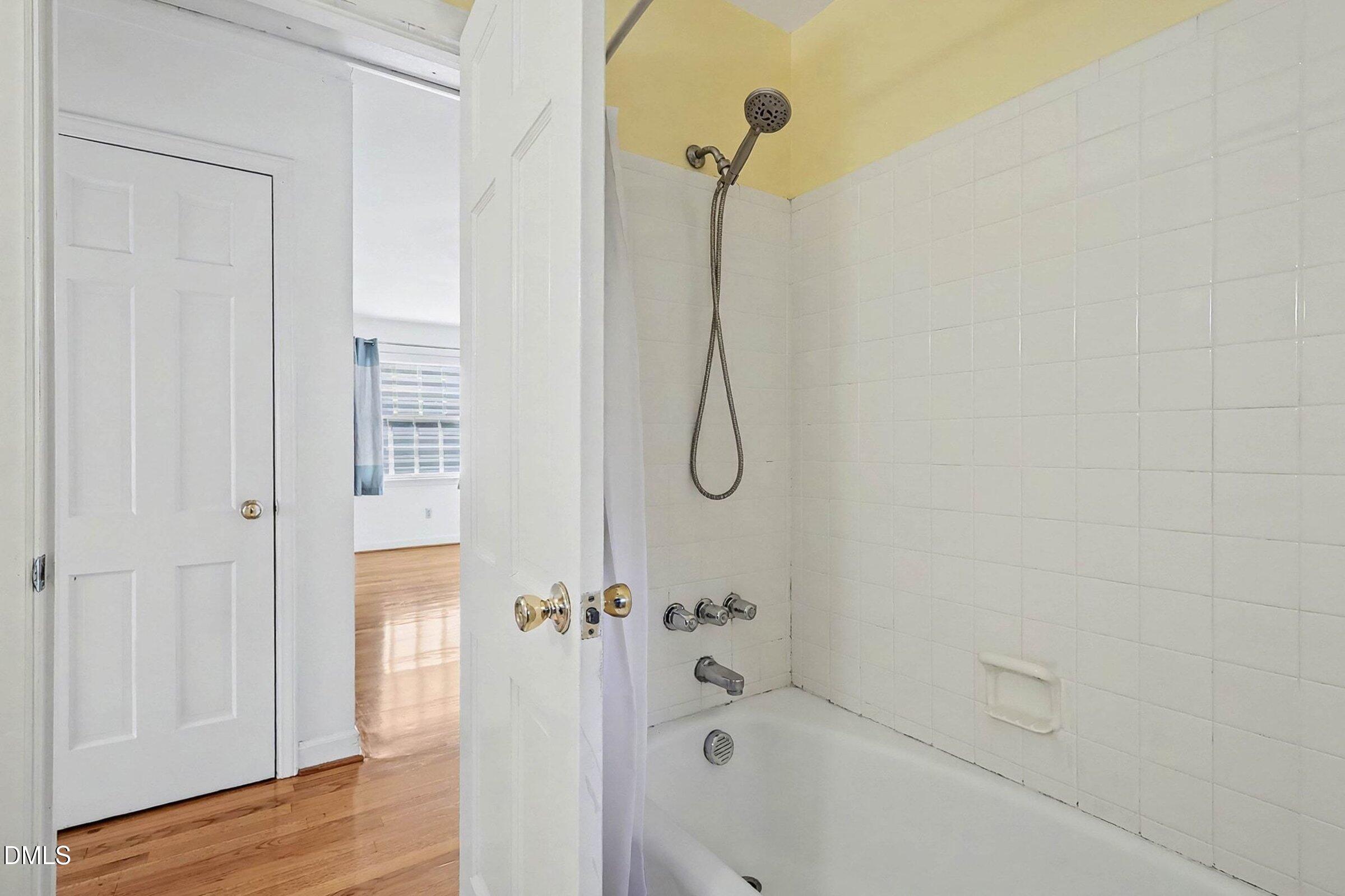 3704 Pembrook Place Raleigh, NC 27612 - Photo 39 of 68 a bathroom with a bathtub