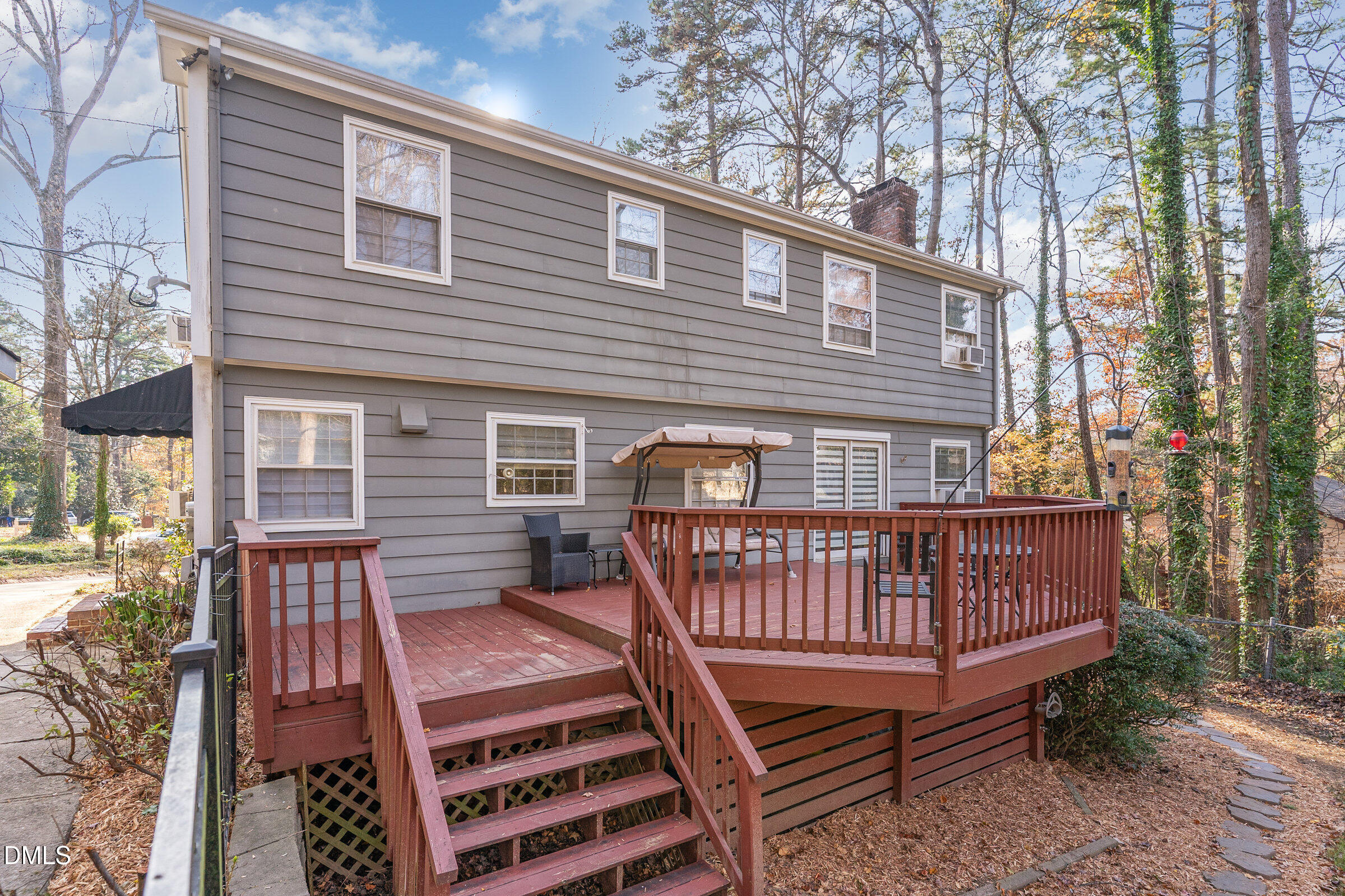 3704 Pembrook Place Raleigh, NC 27612 - Photo 53 of 67 a view of a roof deck with wooden floor and fence