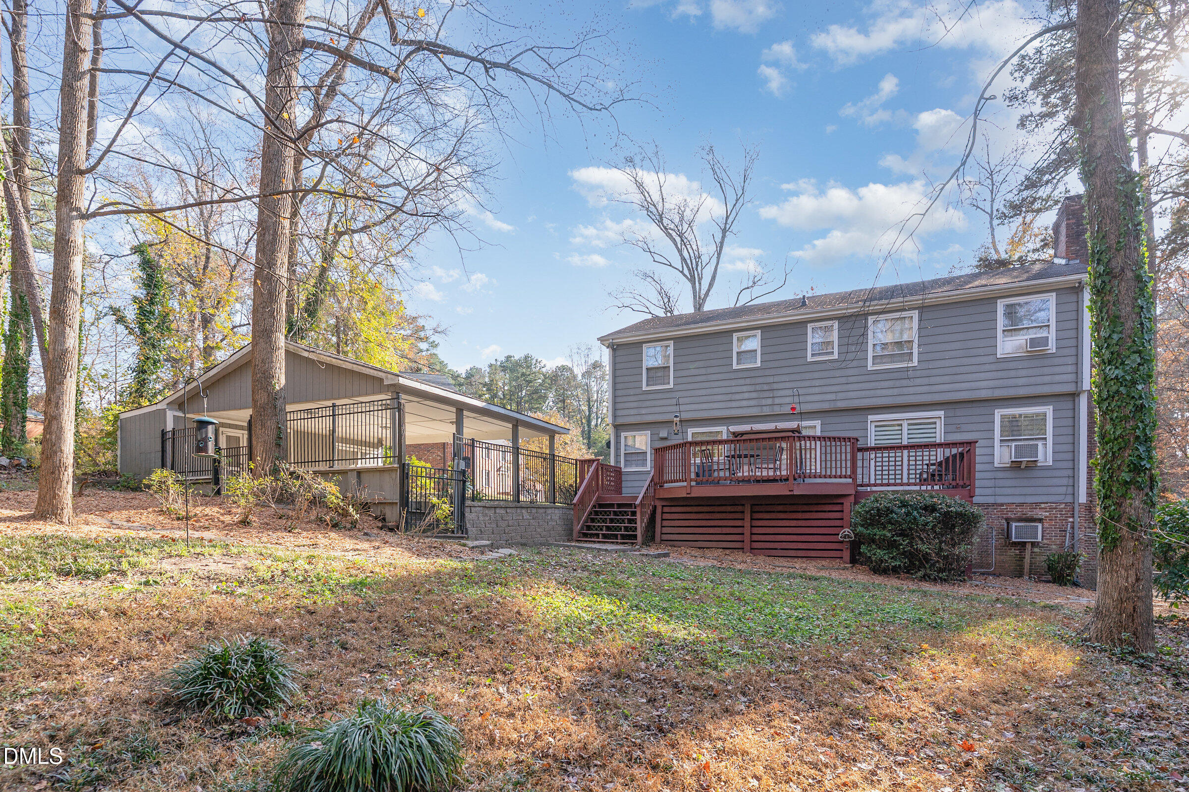 3704 Pembrook Place Raleigh, NC 27612 - Photo 66 of 67 a view of a house with a yard and a large tree
