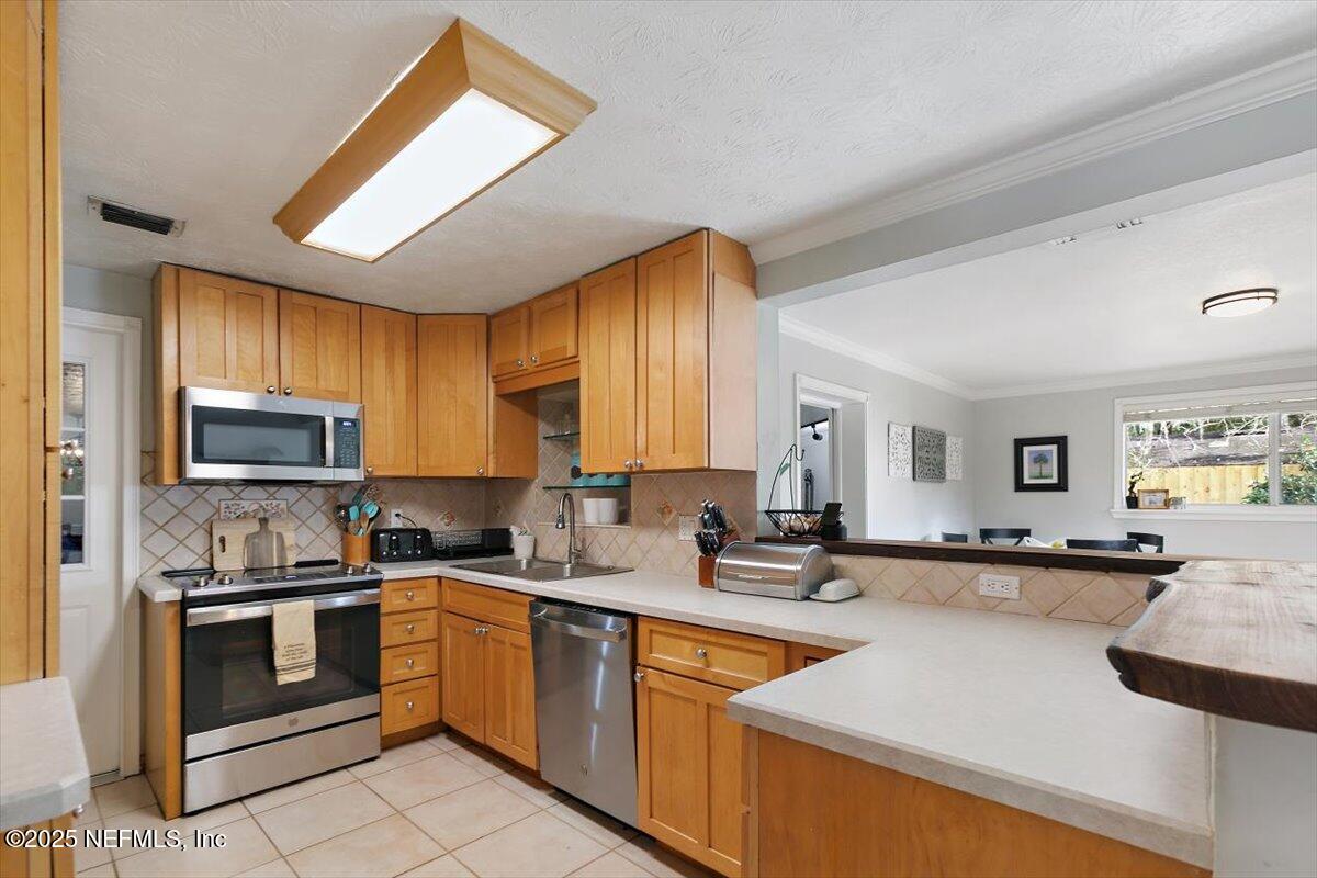 3569 Eunice Road Jacksonville, FL 32250 - Photo 9 of 23 08-Kitchen