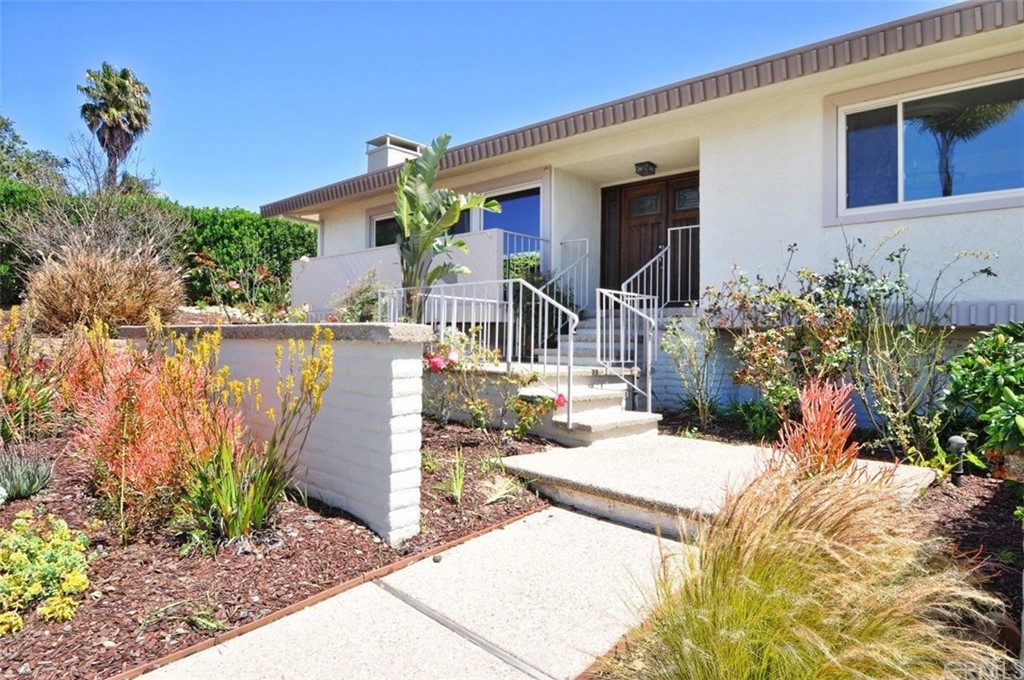 7168 Crest Road Rancho Palos Verdes, CA 90275 - Photo 1 of 1 a view of a house with backyard and sitting area