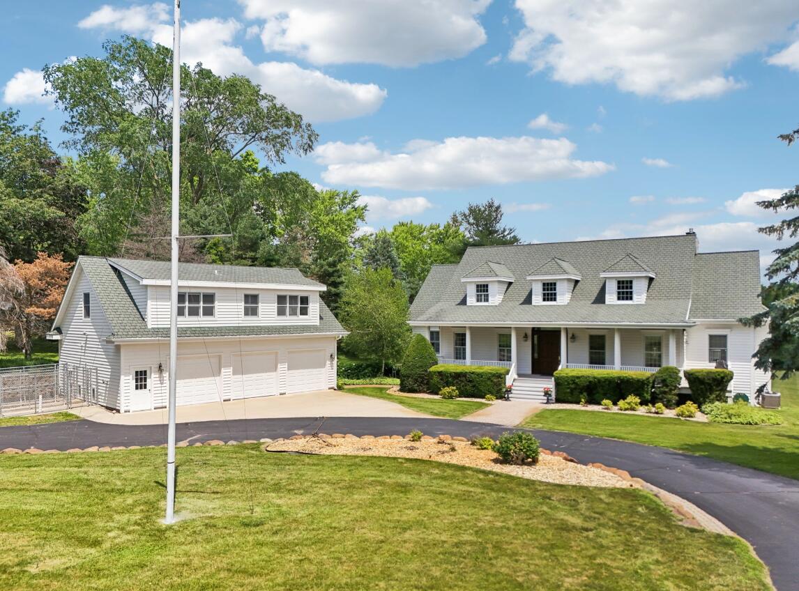 Stately Cape Cod on Private Acreage