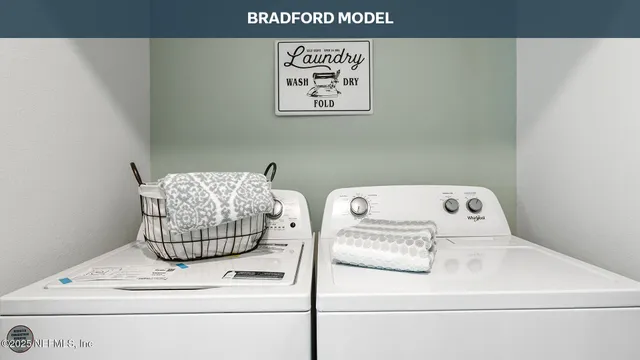 a bedroom with a bed and a night stand