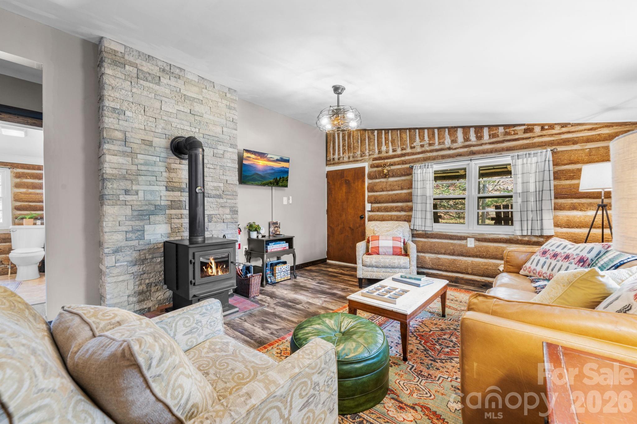 245 Davenport Road Spruce Pine, NC 28777 - Photo 5 of 25 a living room with furniture and a large window