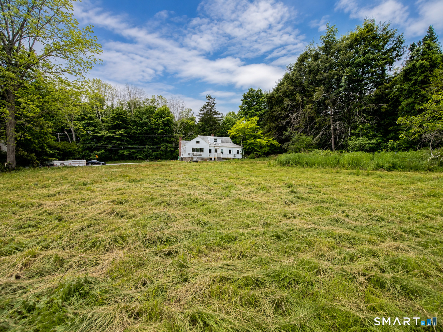 934 Storrs Road Mansfield, CT 06268 - Photo 3 of 20 a view of a green yard