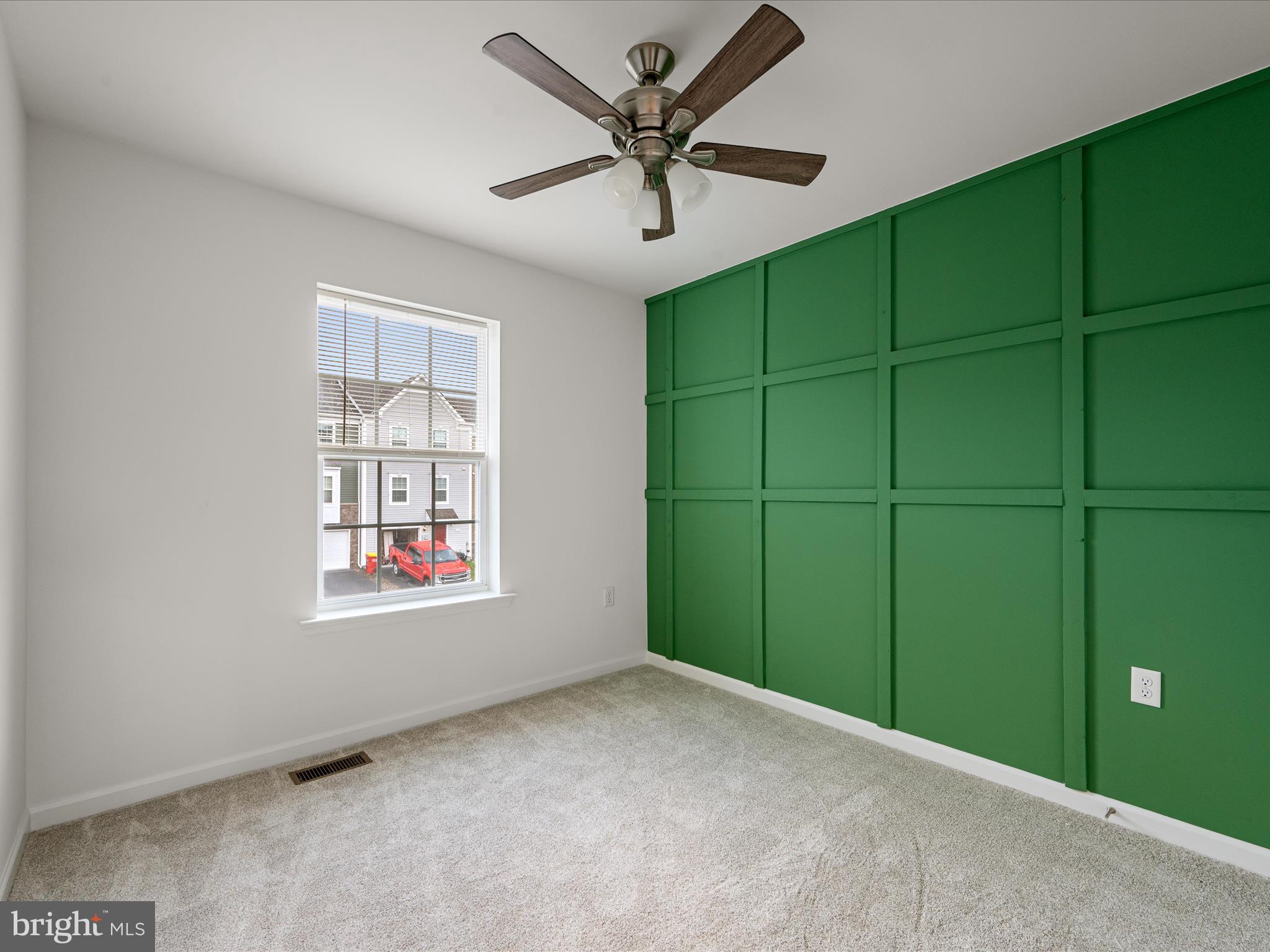 576 Thumper Drive Ranson, WV 25438 - Photo 26 of 37 an empty room with windows and closet