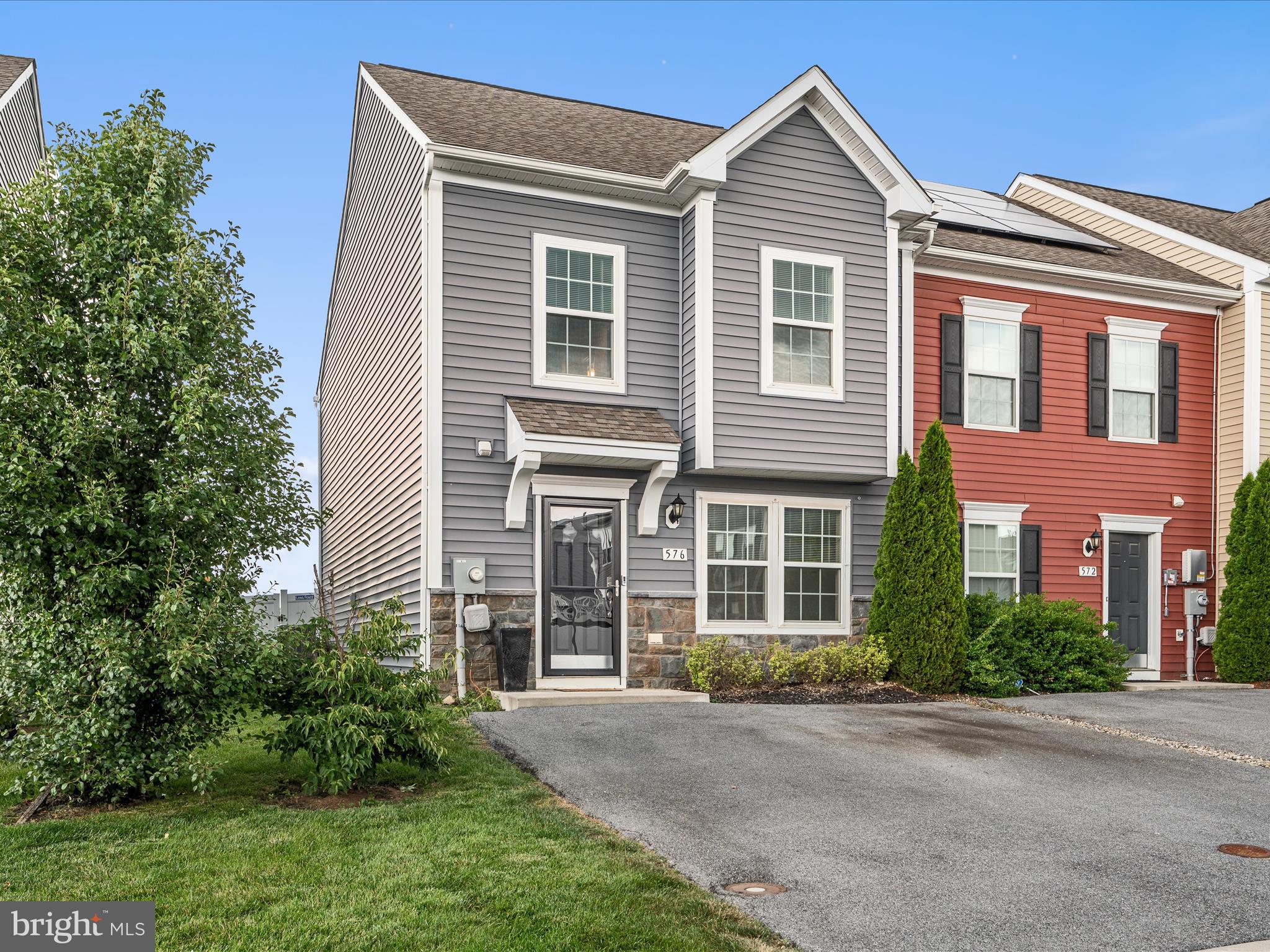 576 Thumper Drive Ranson, WV 25438 - Photo 32 of 37 front view of a house and a yard