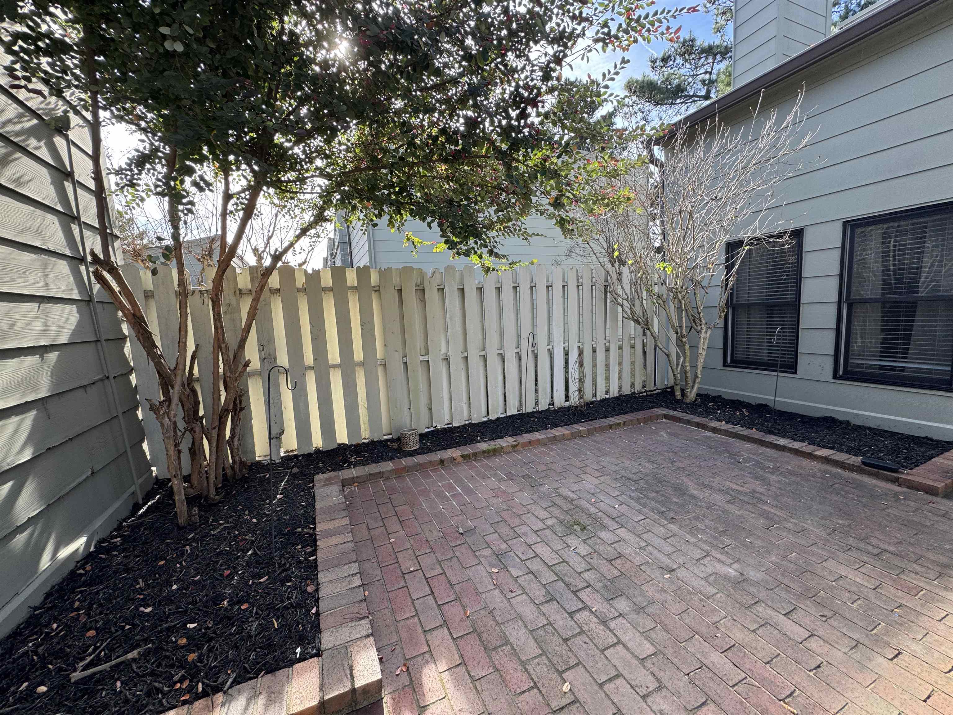 1906 Allenby Road Germantown, TN 38139 - Photo 12 of 31 a view of a backyard with pathway