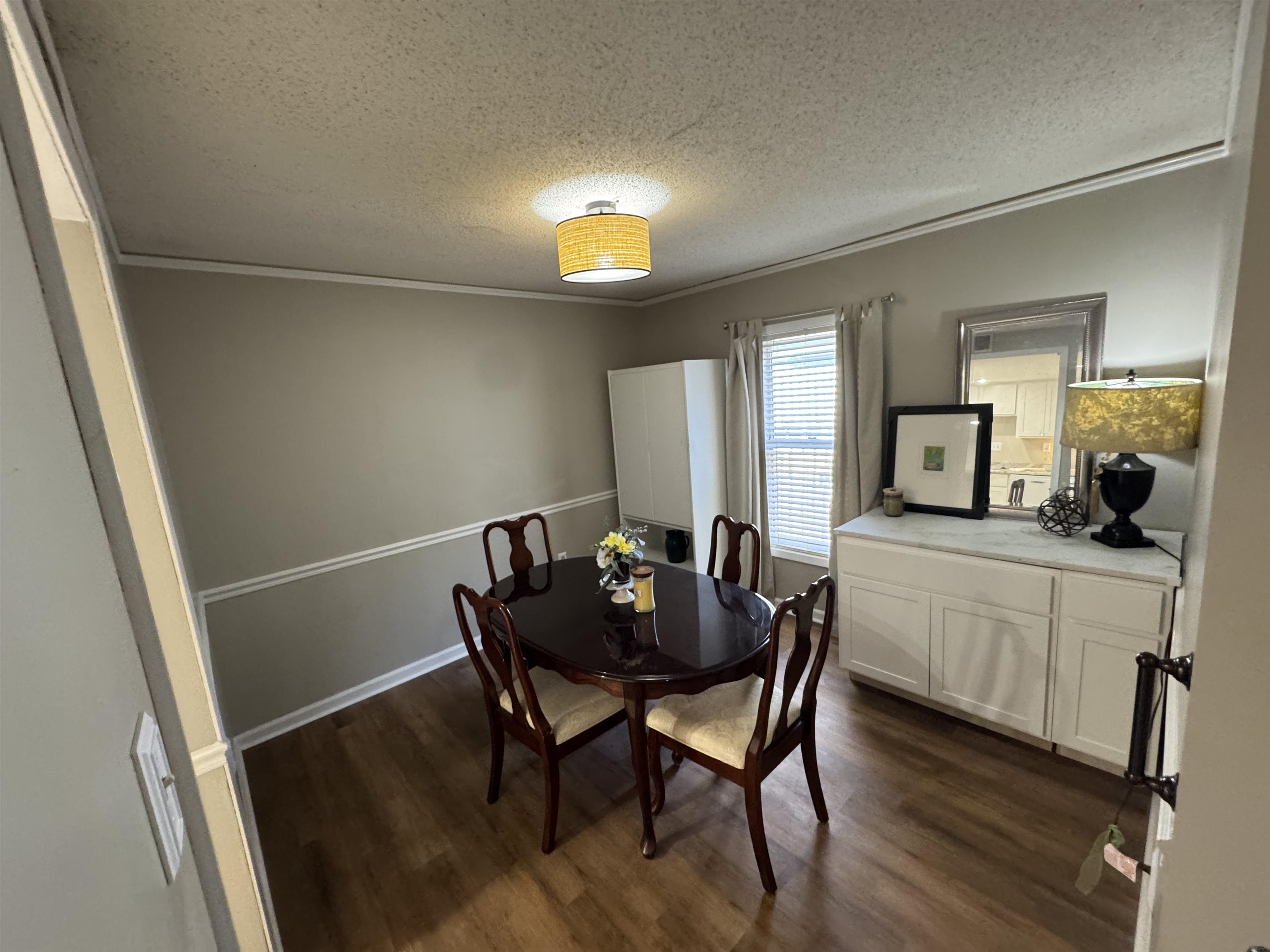 1906 Allenby Road Germantown, TN 38139 - Photo 18 of 31 a view of a dining room with furniture and wooden floor