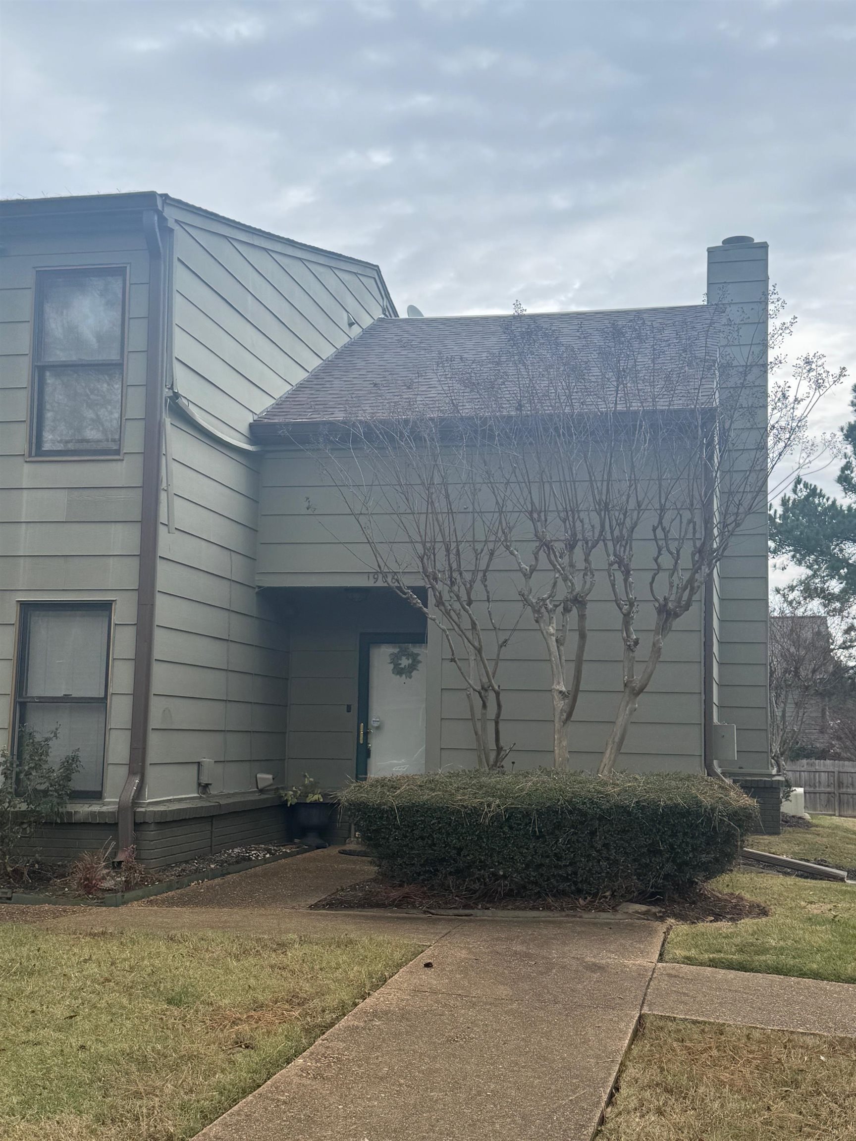 1906 Allenby Road Germantown, TN 38139 - Photo 3 of 31 a front view of a house with a yard