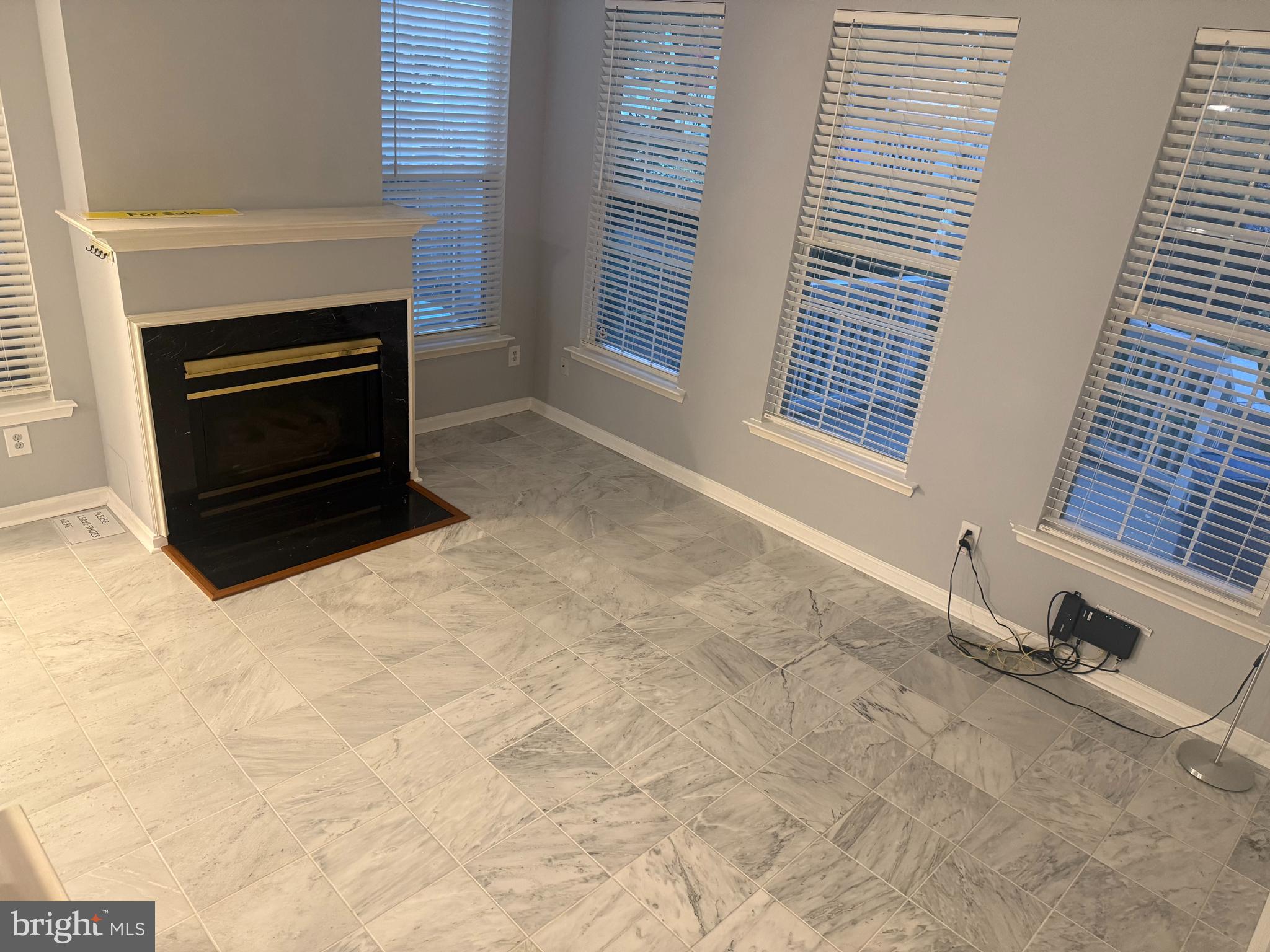 13 Crusader Court Germantown, MD 20874 - Photo 3 of 20 a view of an empty room with a fireplace