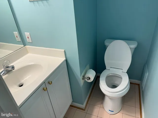a bathroom with a toilet and a sink