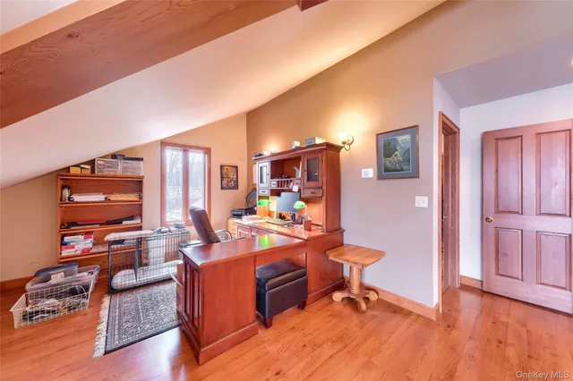 a view of a livingroom with furniture and window