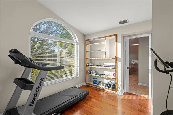 a kitchen with stainless steel appliances granite countertop sink stove top oven and cabinets