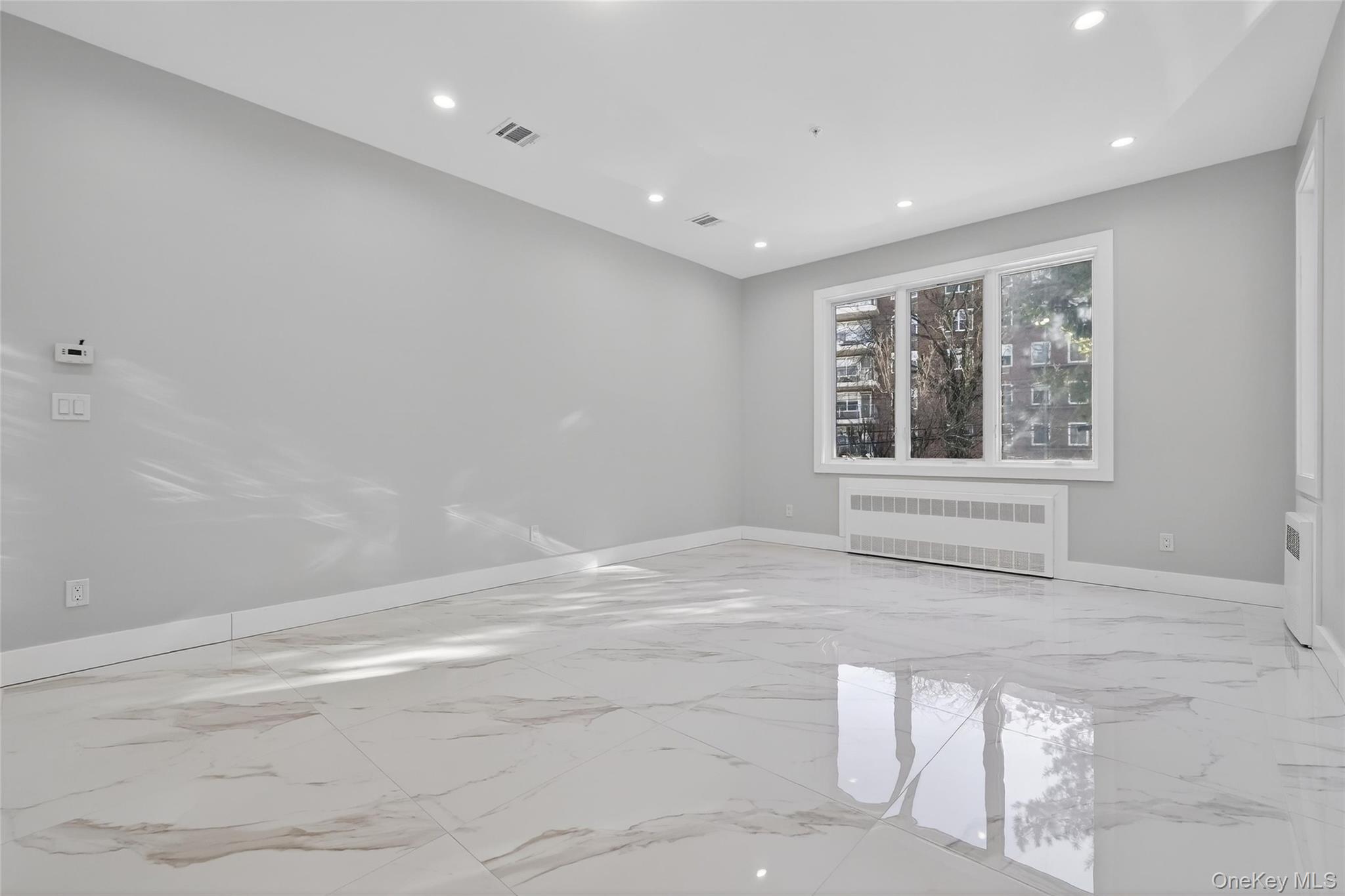 35 South Cole Avenue, Unit 202 Spring Valley, NY 10977 - Photo 14 of 50 a view of an empty room with a window