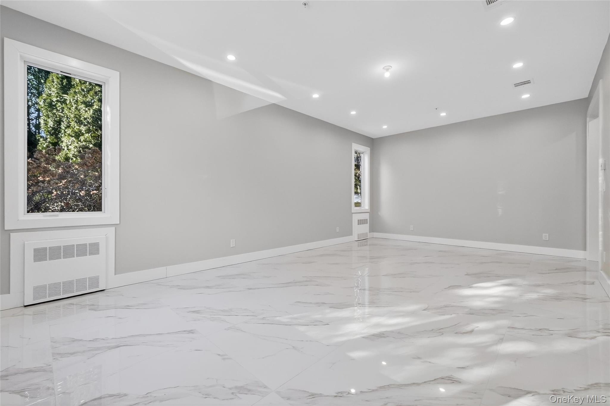 35 South Cole Avenue, Unit 202 Spring Valley, NY 10977 - Photo 16 of 50 a view of an empty room with a window