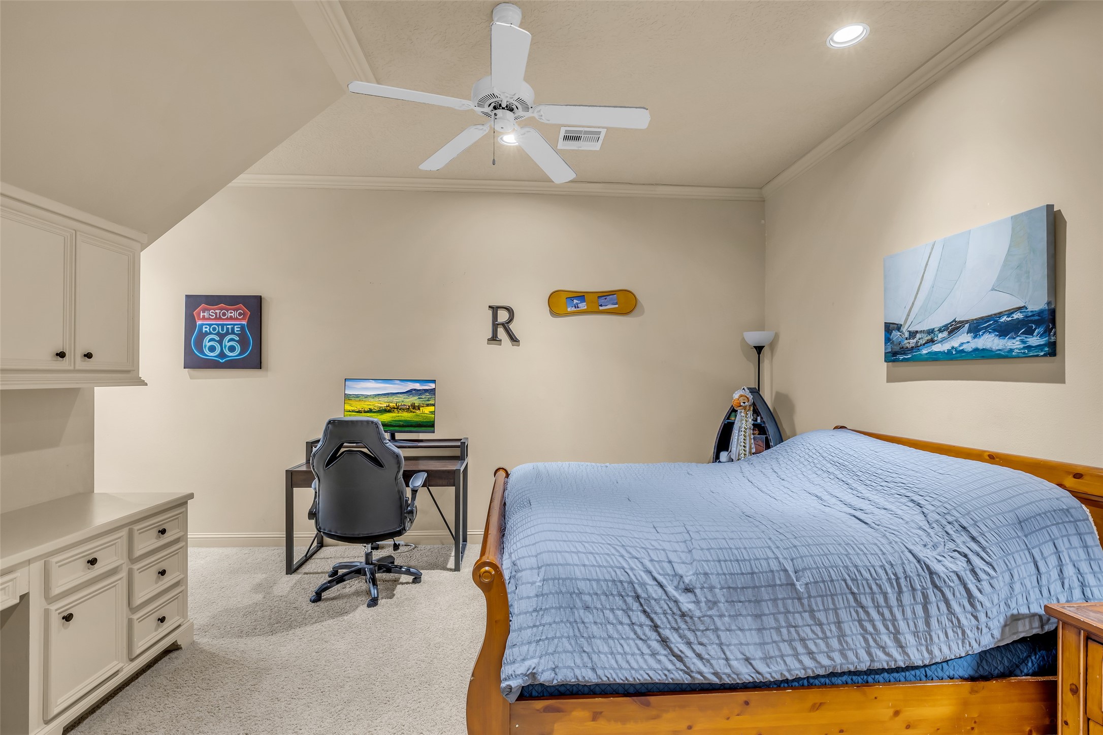 75 South Player Crest Circle Spring, TX 77382 - Photo 31 of 39 a bedroom that has a bed and a chair in it